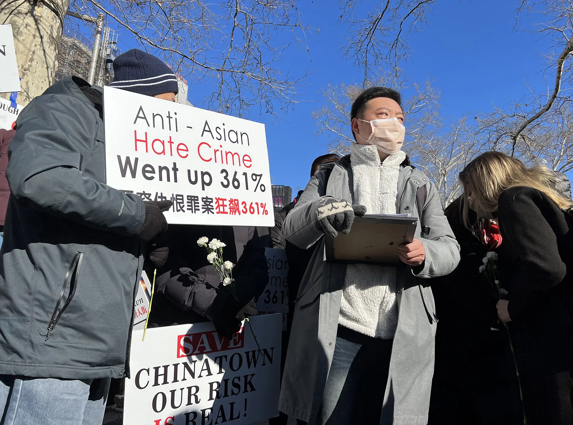 Jackie Wong, a member of Concerned Citizens of East Broadway, right, during a demonstration in New York.