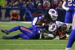 Buffalo Bills cornerback Dane Jackson, bottom, is injured on a play during the first half of an NFL football game against the Tennessee Titans, Monday, Sept. 19, 2022, in Orchard Park, N.Y. (AP Photo/Jeffrey T. Barnes)