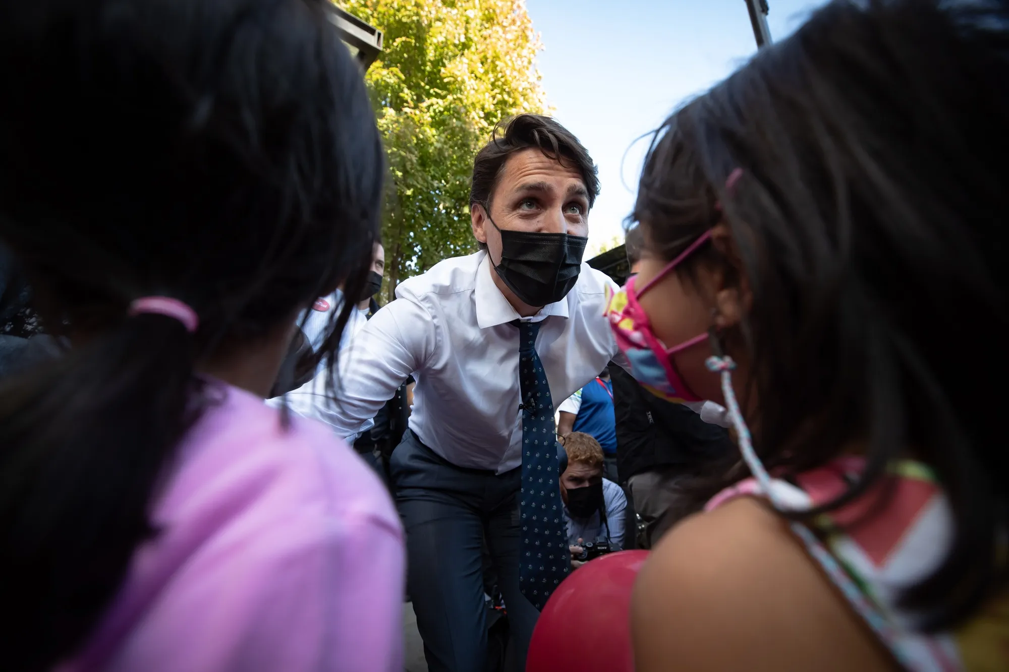 Justin Trudeau greets children while campaigning in Port Coquitlam, British Columbia on Sept. 13.