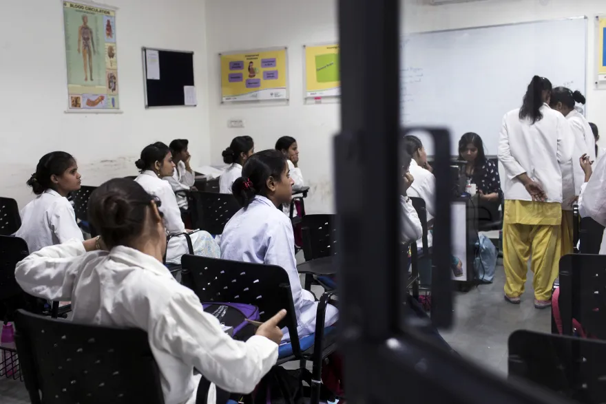 Students attend a nursing class during vocational training at the Infrastructure Leasing &amp; Financial Services Institute of Skills in New Delhi.