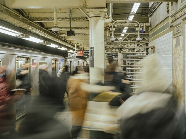 A crowd of commuters at the Wall Street subway station in New York. 