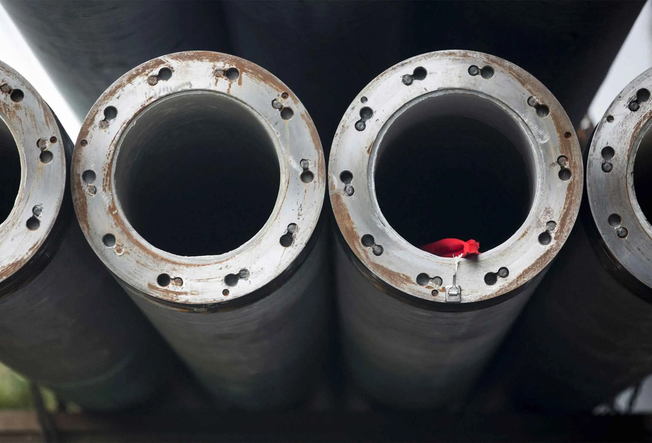 Steel pipes sit on a truck as it leaves a Kobe Steel plant in Kobe, Japan, on Oct. 13, 2017.