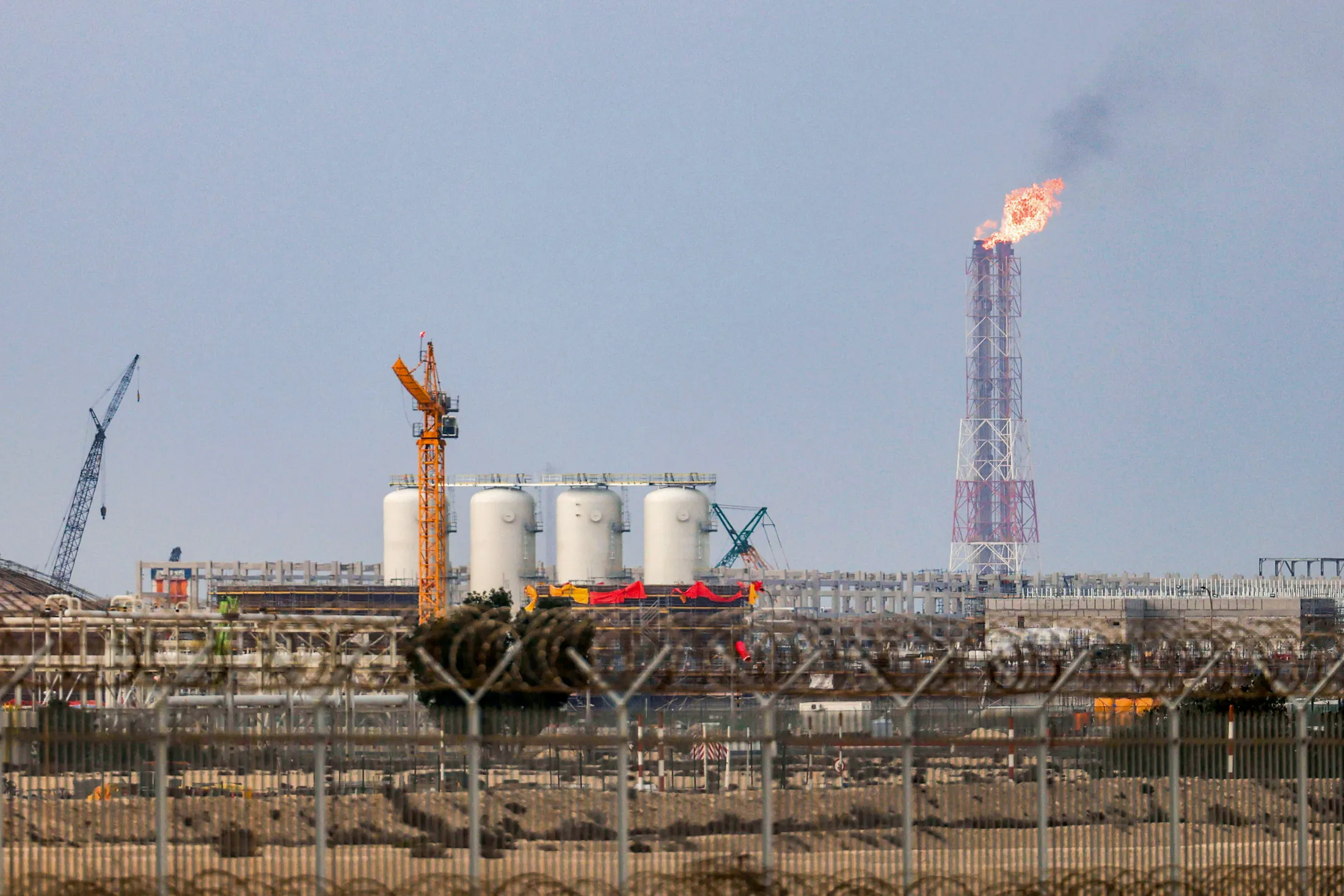 03 March 2026, Qatar, Ras Laffan: Aview of the liquefied natural gas (LNG) production facility in Qatar's Ras Laffan Industrial City. Photo: Stringer/dpa (Photo by Stringer/picture alliance via Getty Images)
