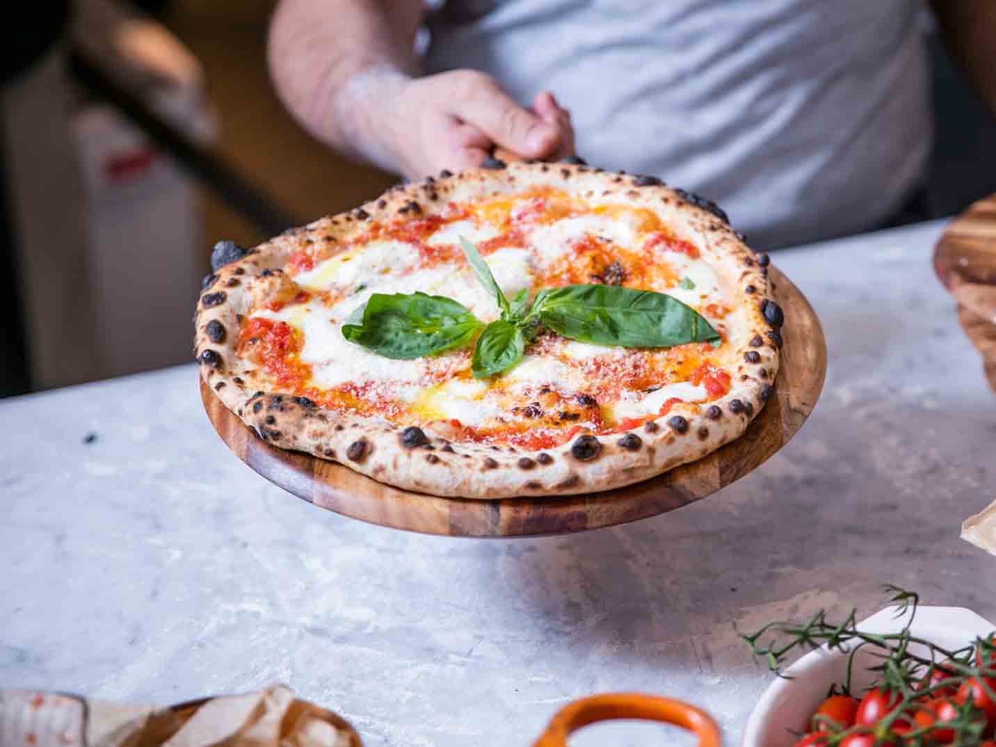 Pizza Margherita baked by Francesco Mazzei.