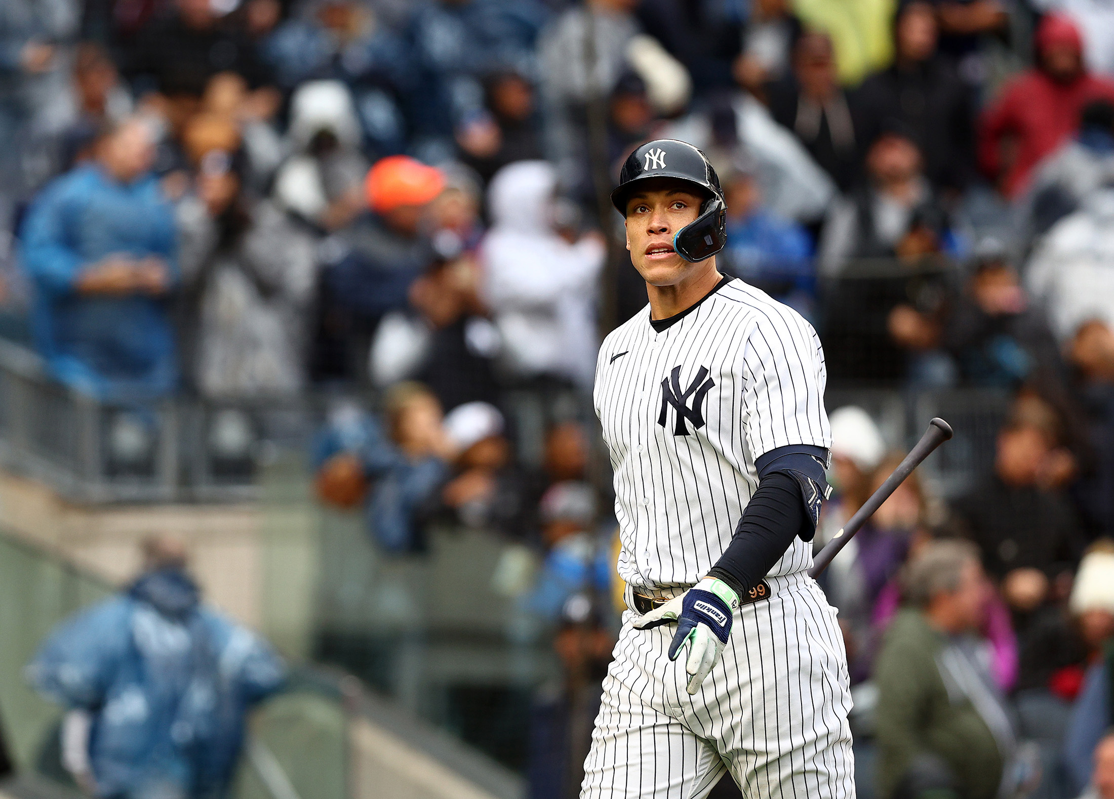 New York Yankees Aaron Judge walks off the field after batting