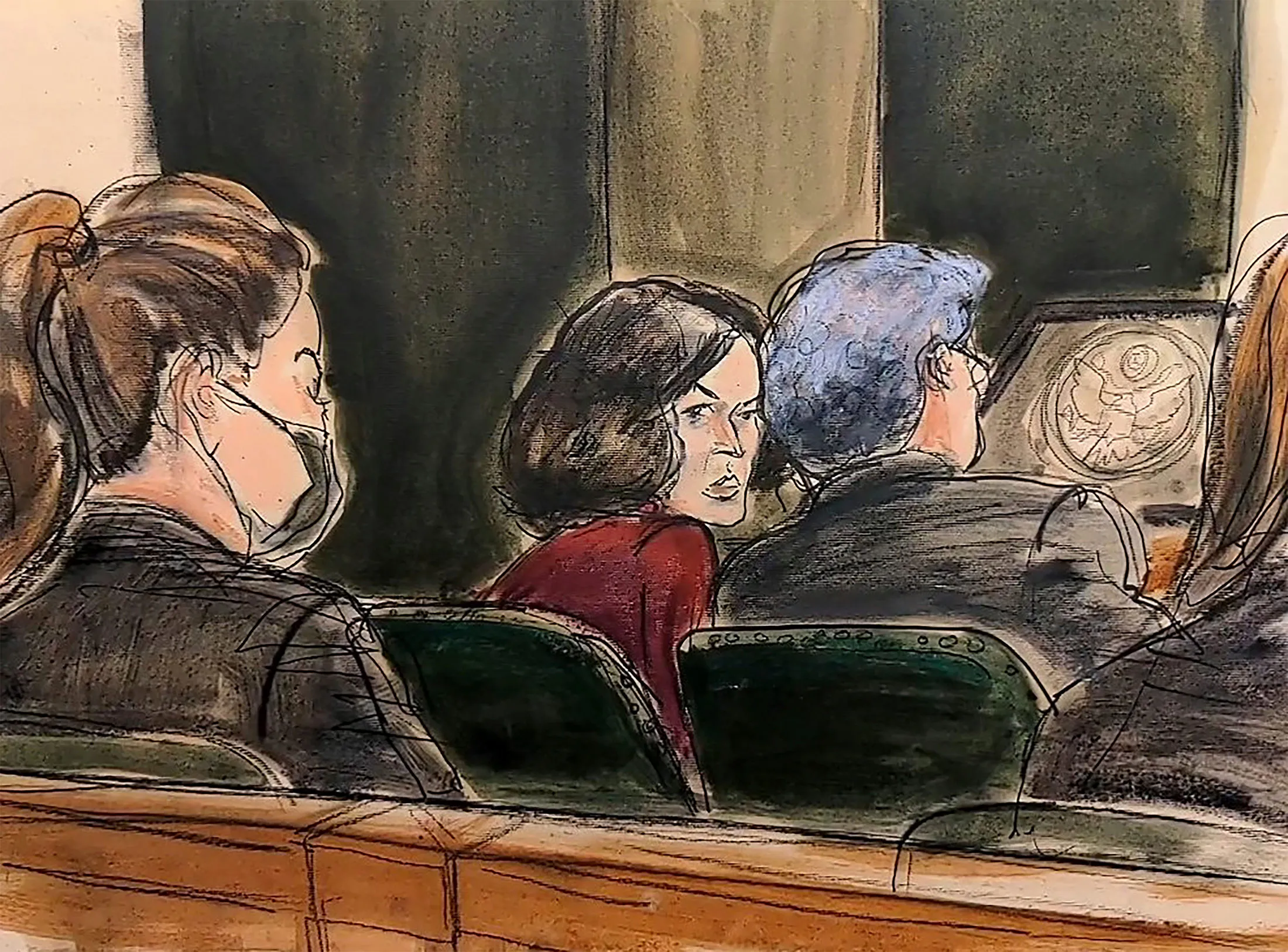 In this courtroom sketch, Ghislaine Maxwell, center, confers with her defense attorney before testimony begins in her trial, in New York, on&nbsp;Dec. 8.