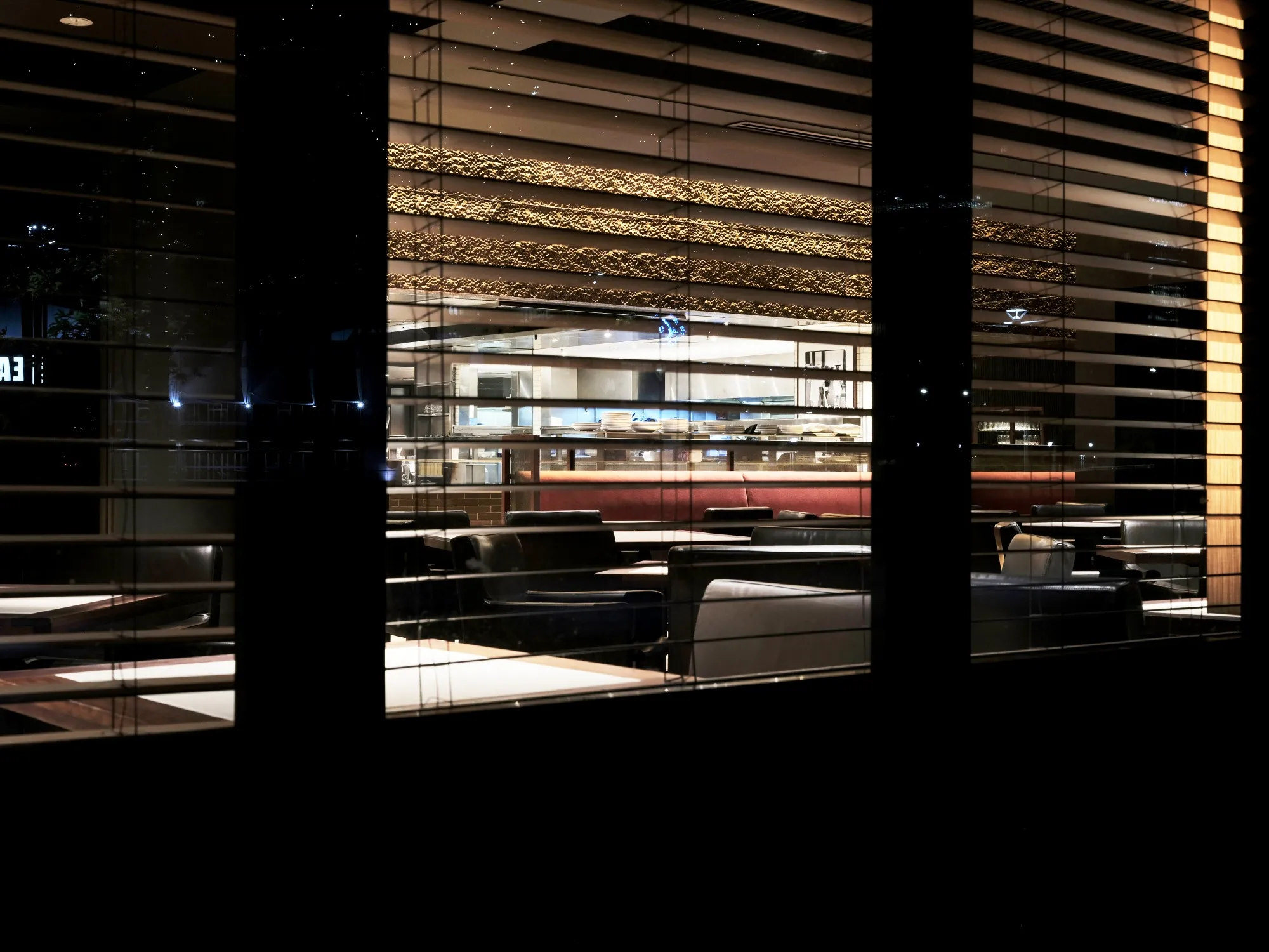 A restaurant stands closed at night during a partial lockdown imposed due to the coronavirus in Melbourne on April 9.