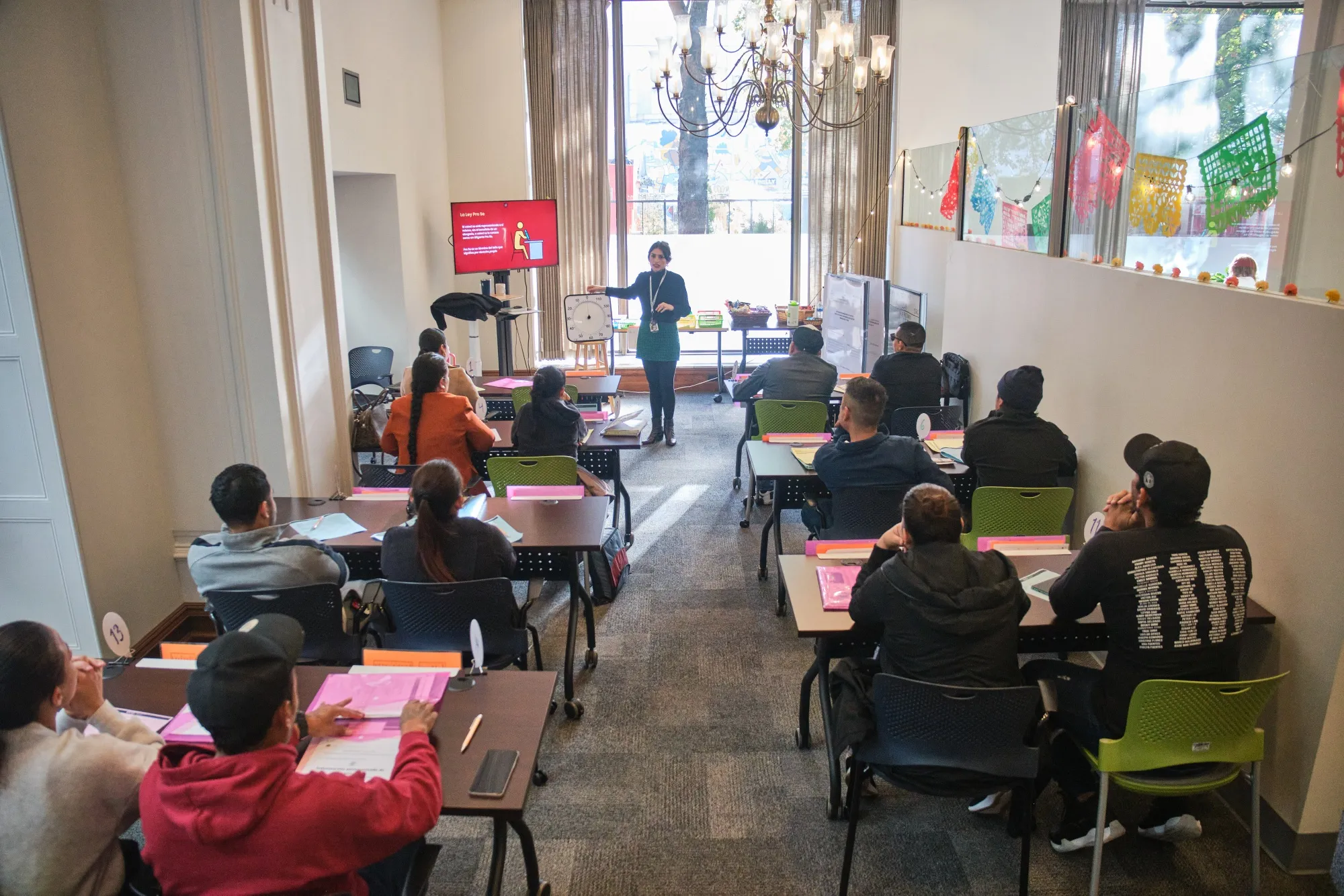 Asylum-seekers attend a free legal clinic at Innovation Law Lab in downtown Portland, Oregon.