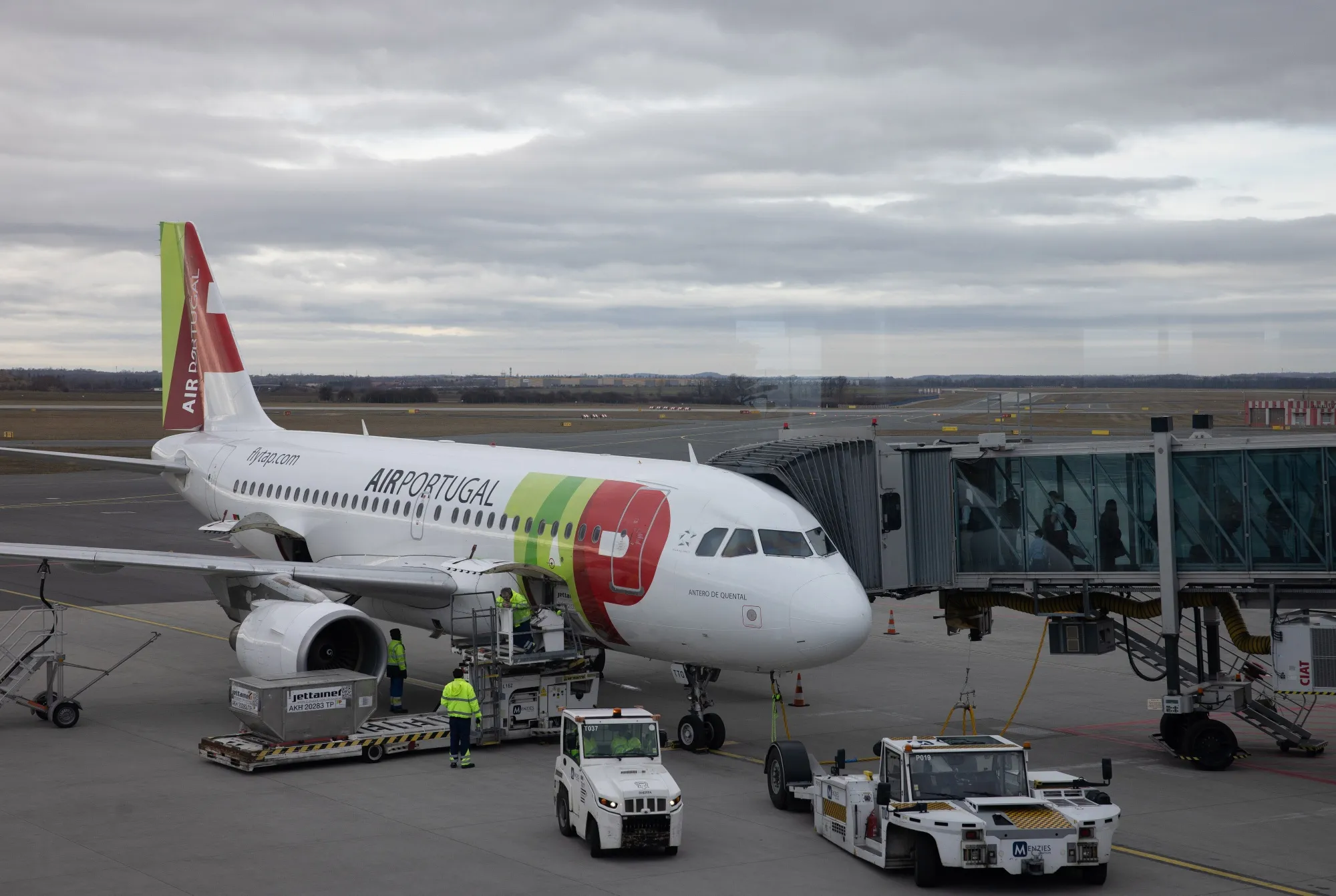 Passengers board a TAP Air Portugal passenger jet&nbsp;at Vaclav Havel Airport in Prague.