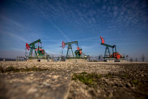 Oil pumping units operate in Uhrice, Czech Republic, on March 23, 2015.