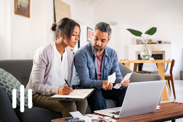 Mid adult couple working on home finance