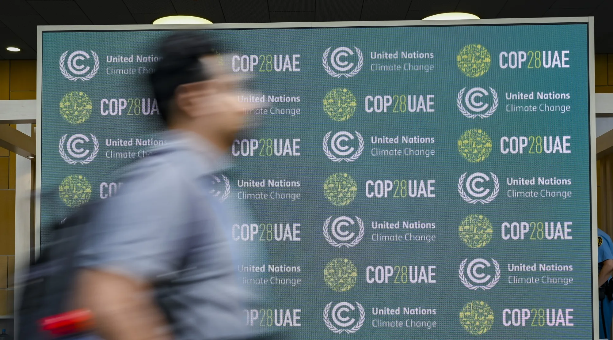 A COP28UAE banner.