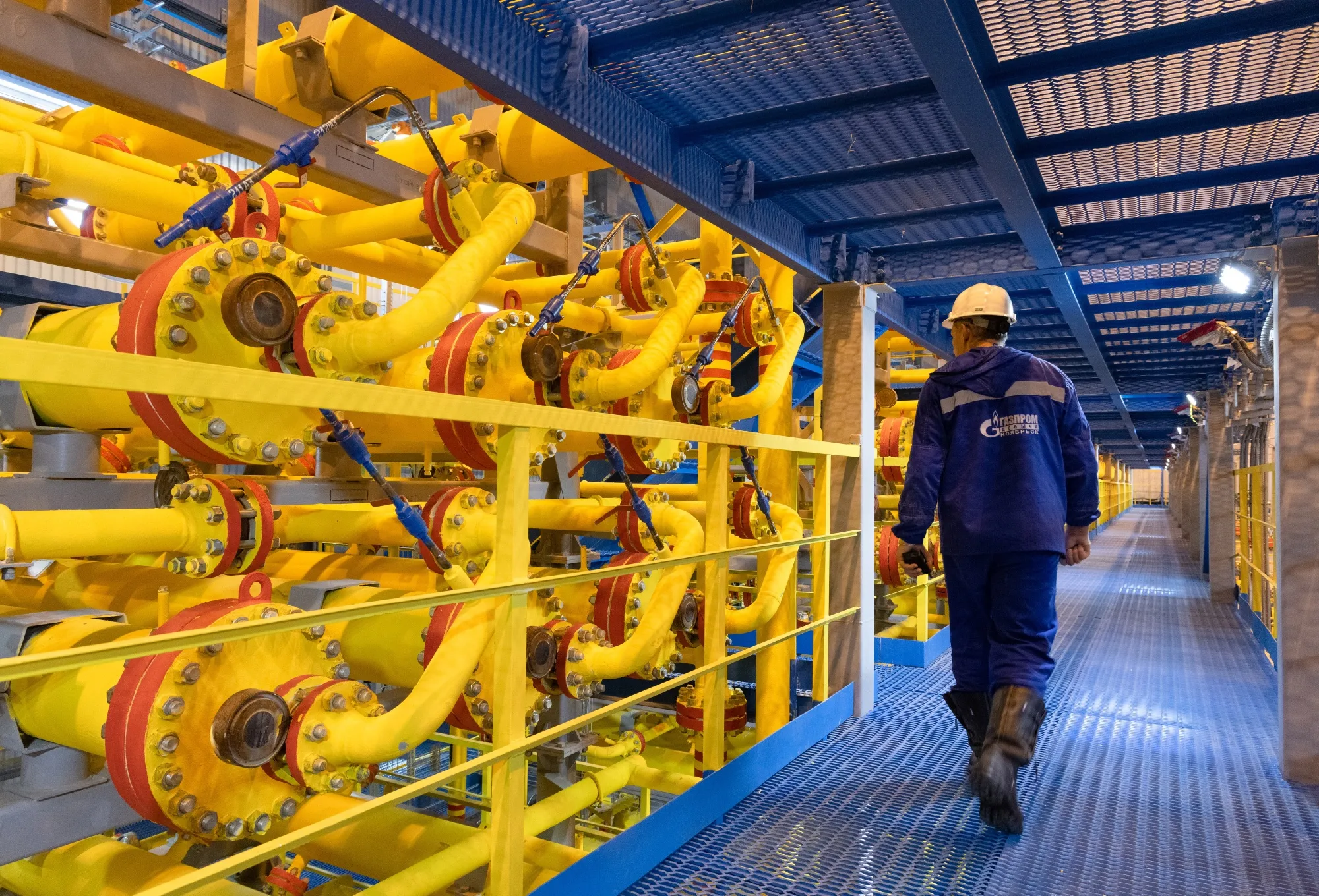 A worker checks pipework at an oil, gas and condensate field in&nbsp;Sakha Republic, Russia.&nbsp;