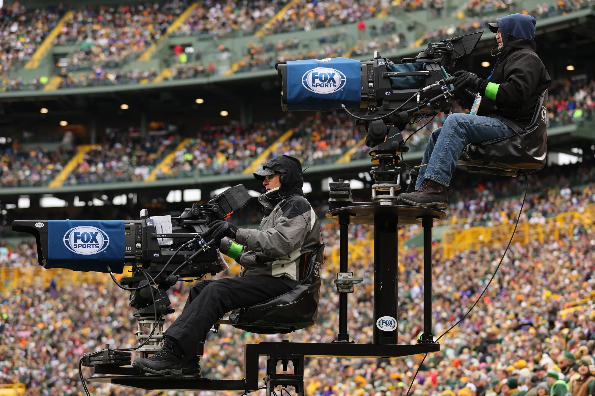 Fox Sports cameras at Lambeau Field in Green Bay, Wisconsin during an NFL game.
