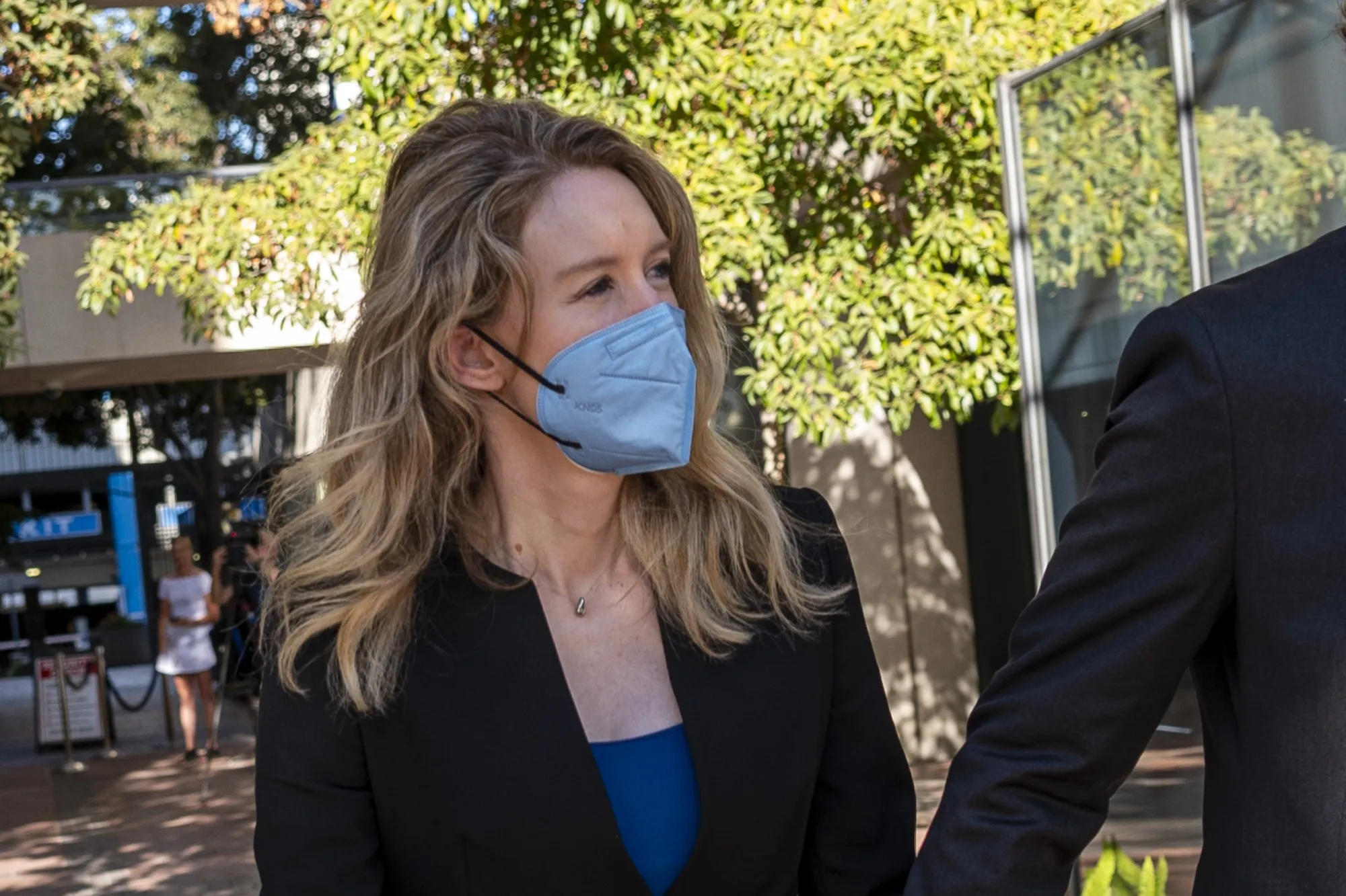 Elizabeth Holmes leaves federal court in San Jose, California, on Sept. 22.