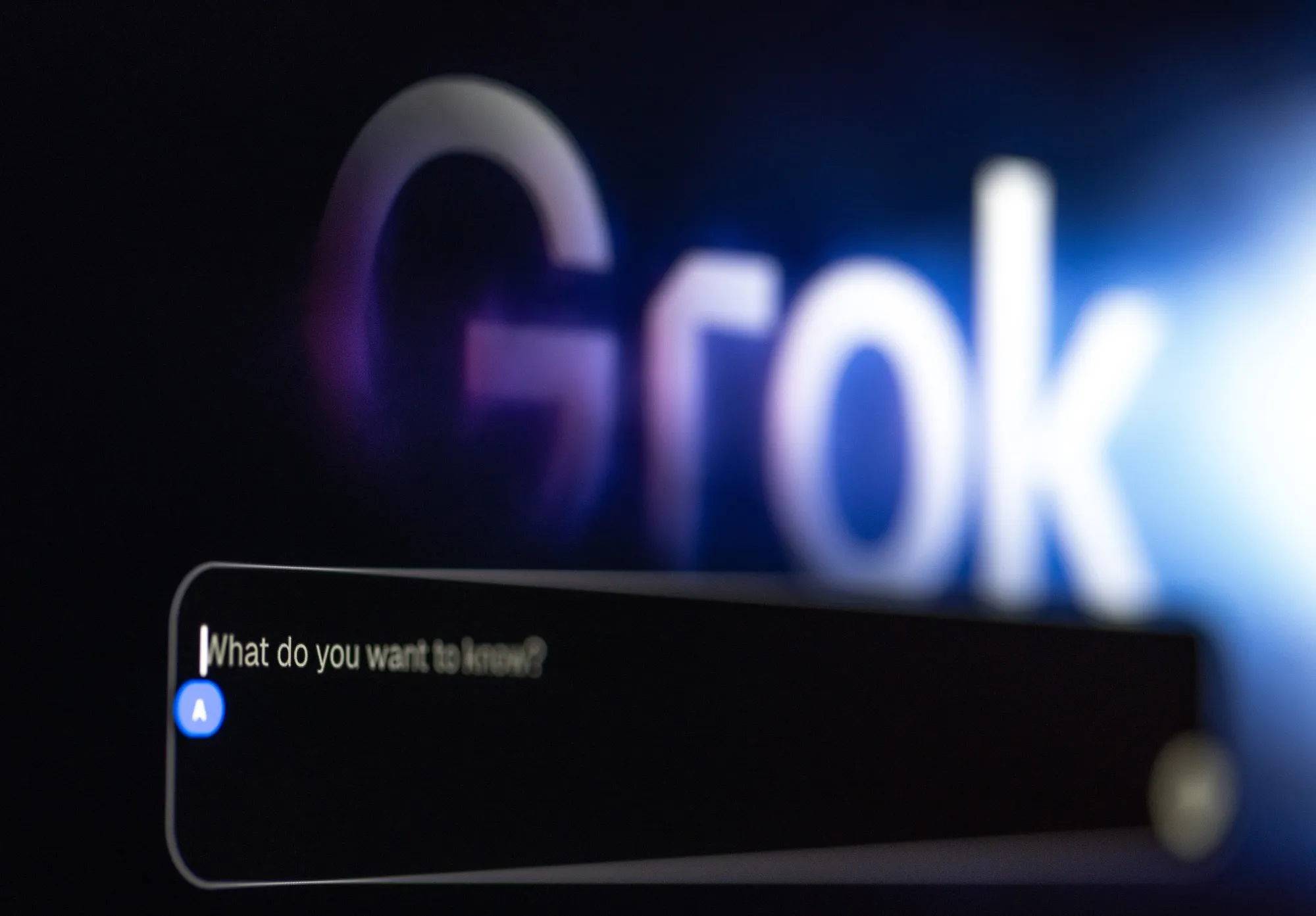 The chat window for chatbot Grok on a laptop.