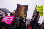 Demonstrators hold signs in front of anti-abortion protestors&nbsp;in Washington, DC.
