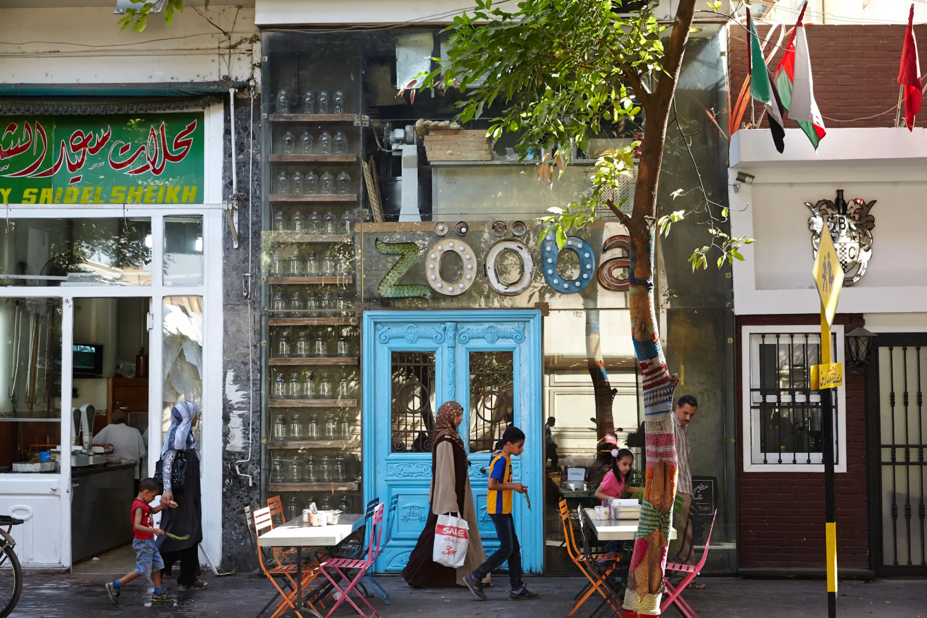 Pedestrians walk on a street in Cairo, Egypt.&nbsp;Photographer: Shawn Baldwin/Bloomberg