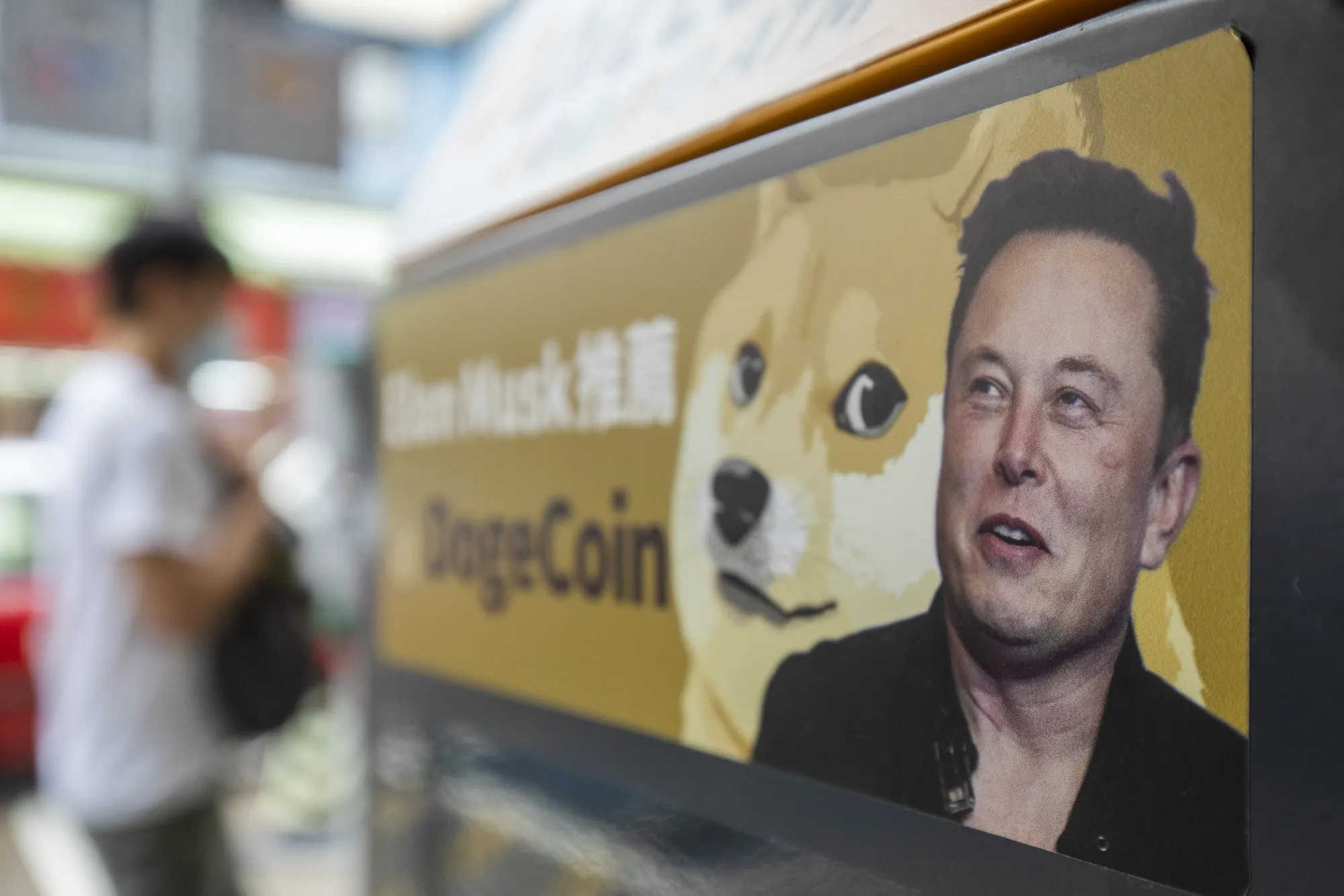 A sticker advertising Dogecoin on a crypto ATM&nbsp;in Hong Kong.