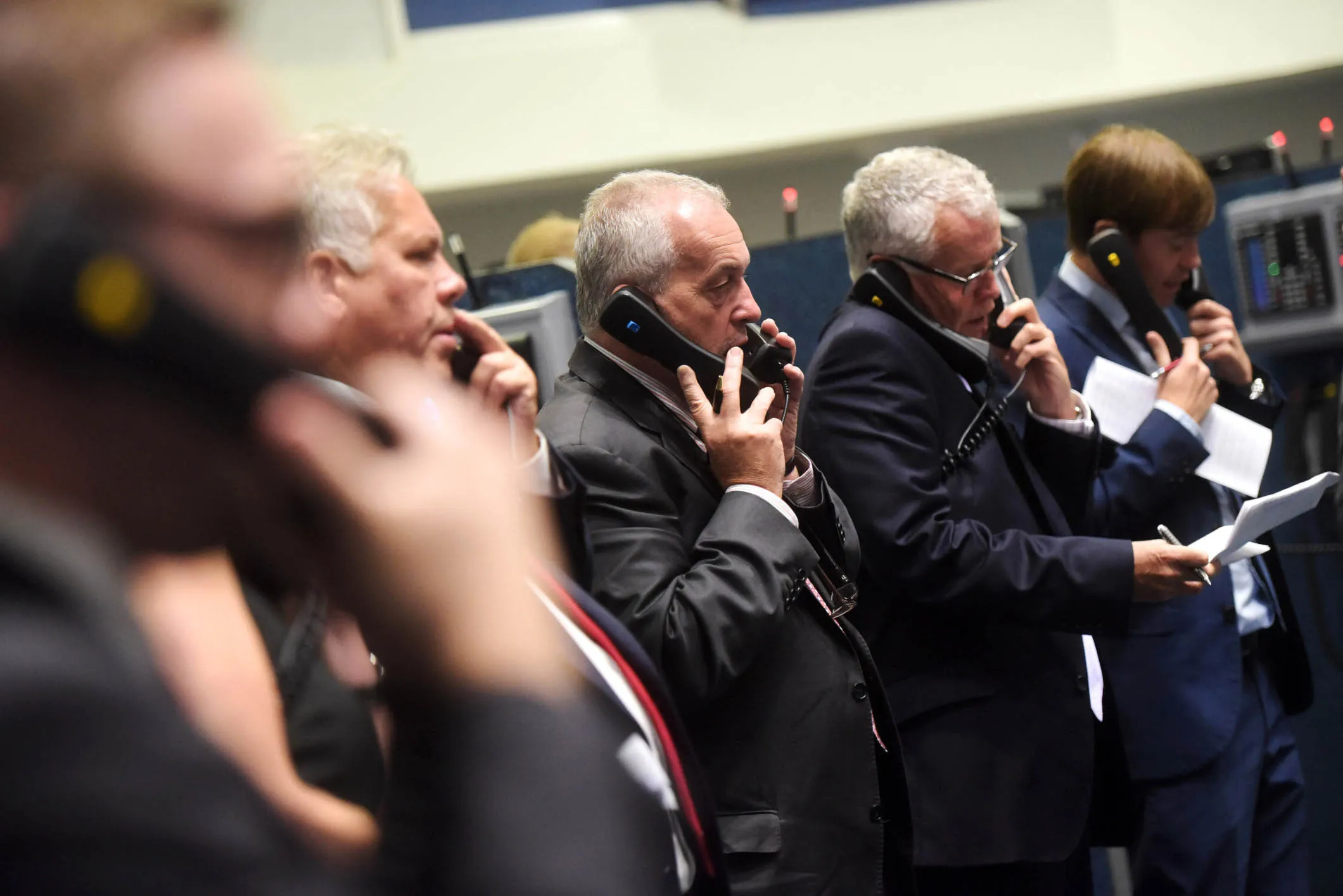 Traders work from the trading floor at the London Metal Exchange.
