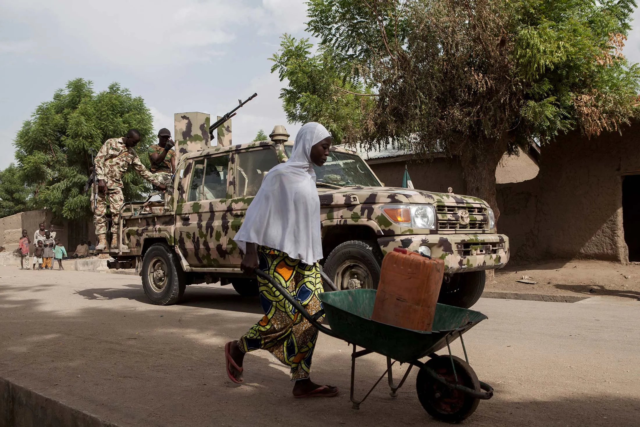 Nigerian soldiers patrol in the town of Banki in northeastern Nigeria on April 26, 2017.
