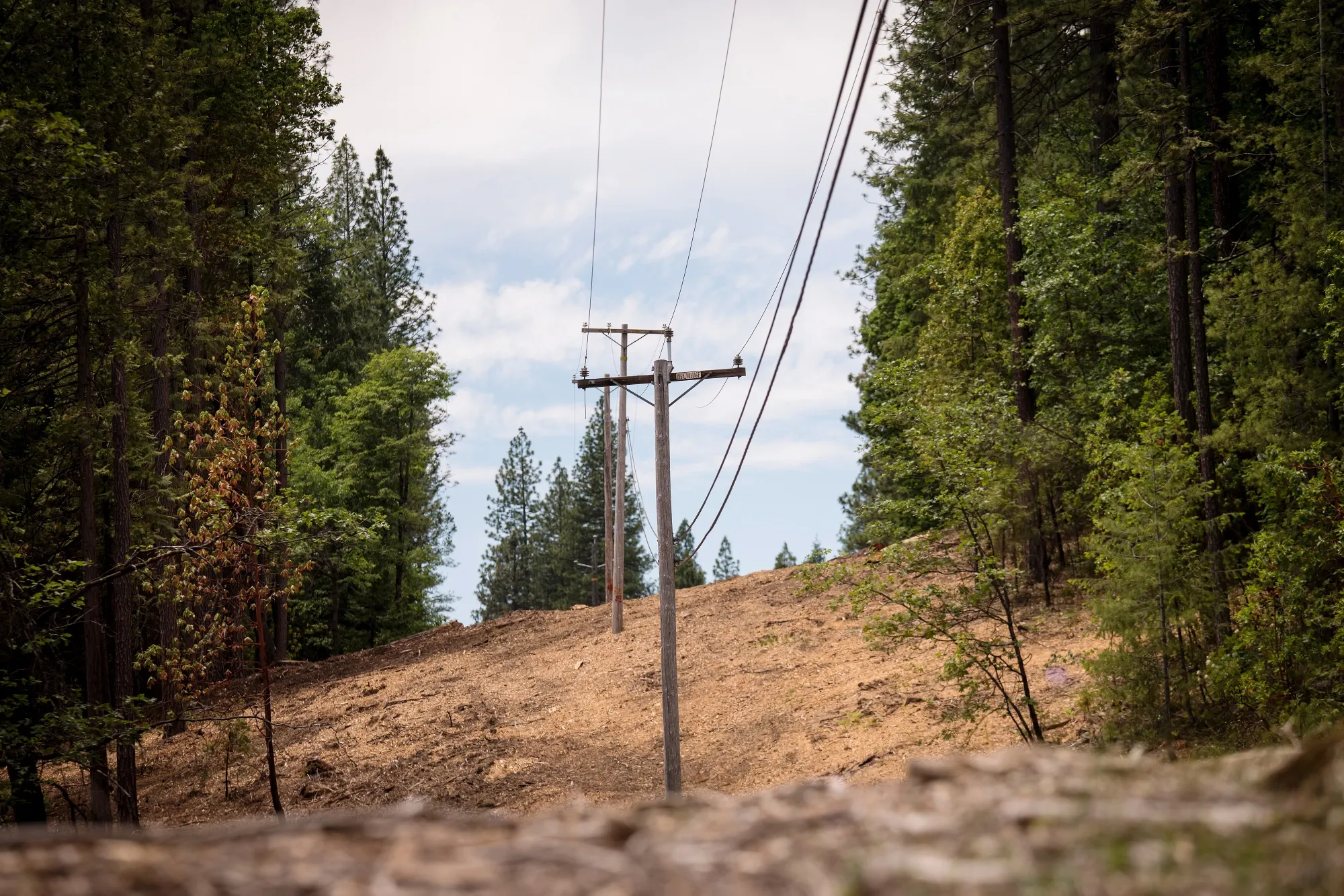 Pacific Gas &amp; Electric Co. (PG&amp;E) transformers and power lines stand in Nevada City, California.