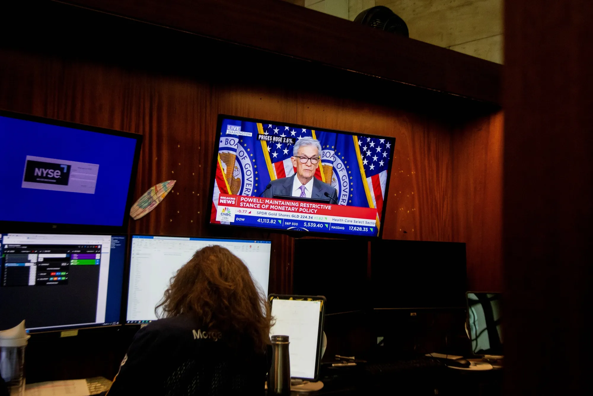 A television station broadcasts Jerome Powell&nbsp;after a Federal Open Market Committee meeting on the floor of the New York Stock Exchange on July 31.