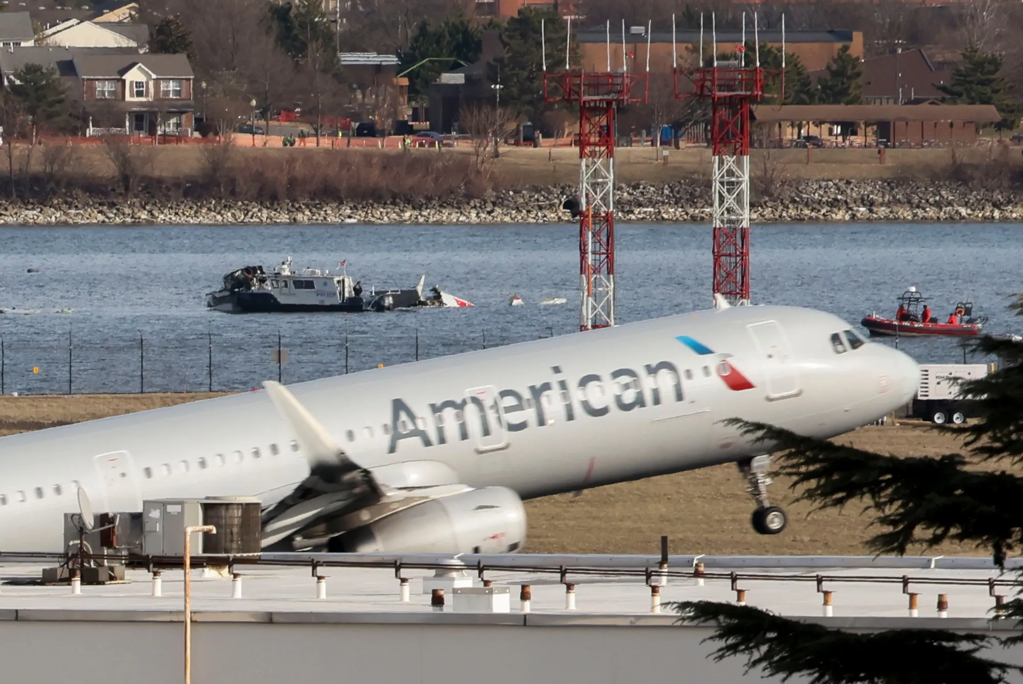 Emergency crews work at the crash site on the Potomac River after a passenger jet collided with a helicopter while landing in Arlington, Virginia, on Jan. 30.