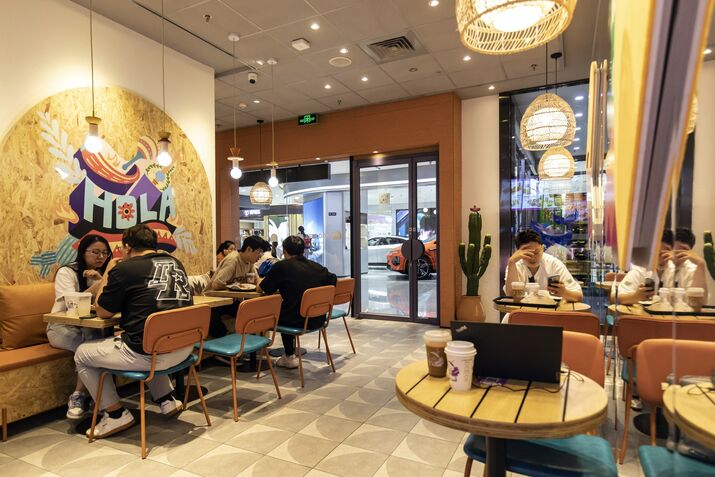 Customers at a Yum China Taco Bell restaurant in Xi'an, China.