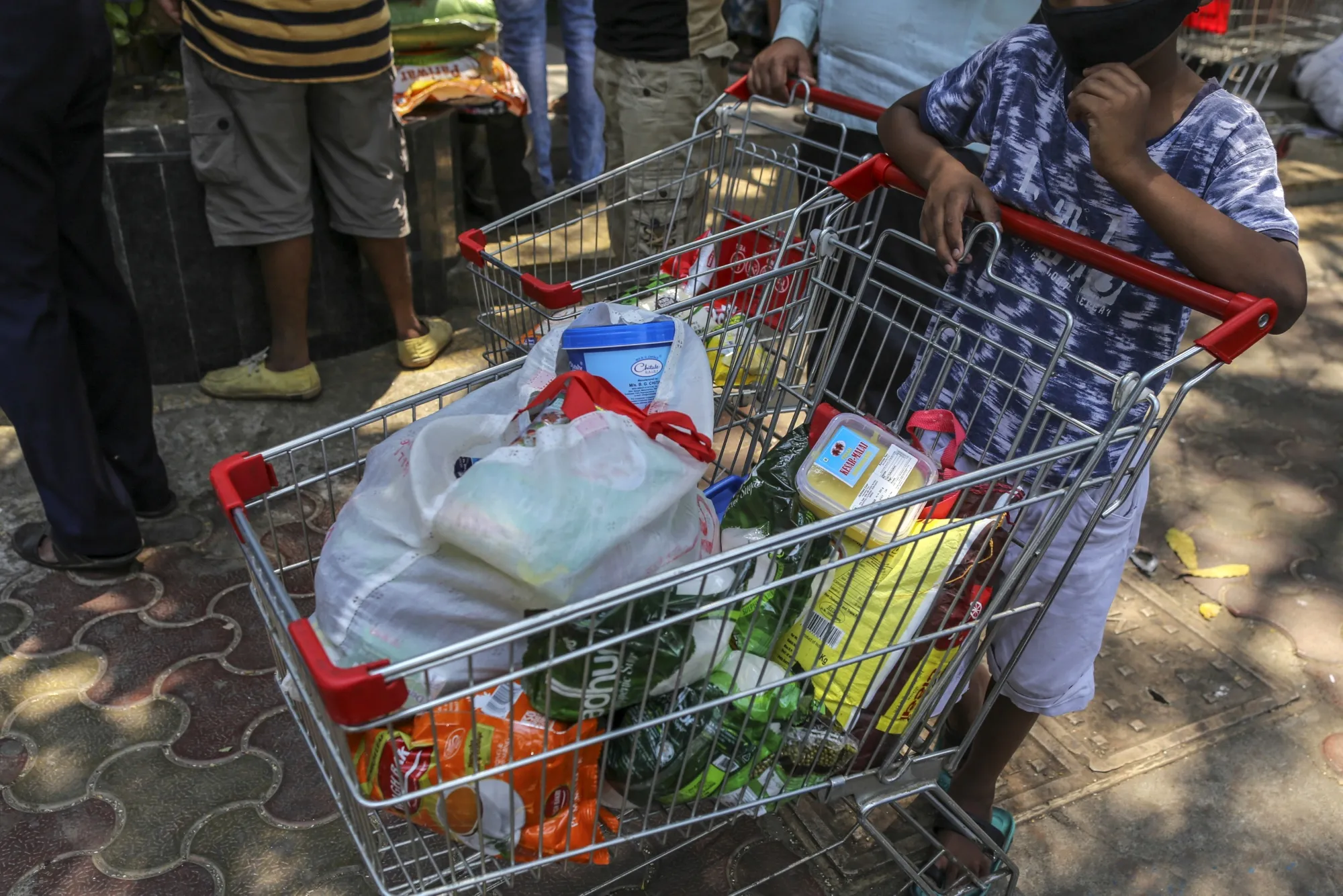 Customers at a supermarket in Mumbai.