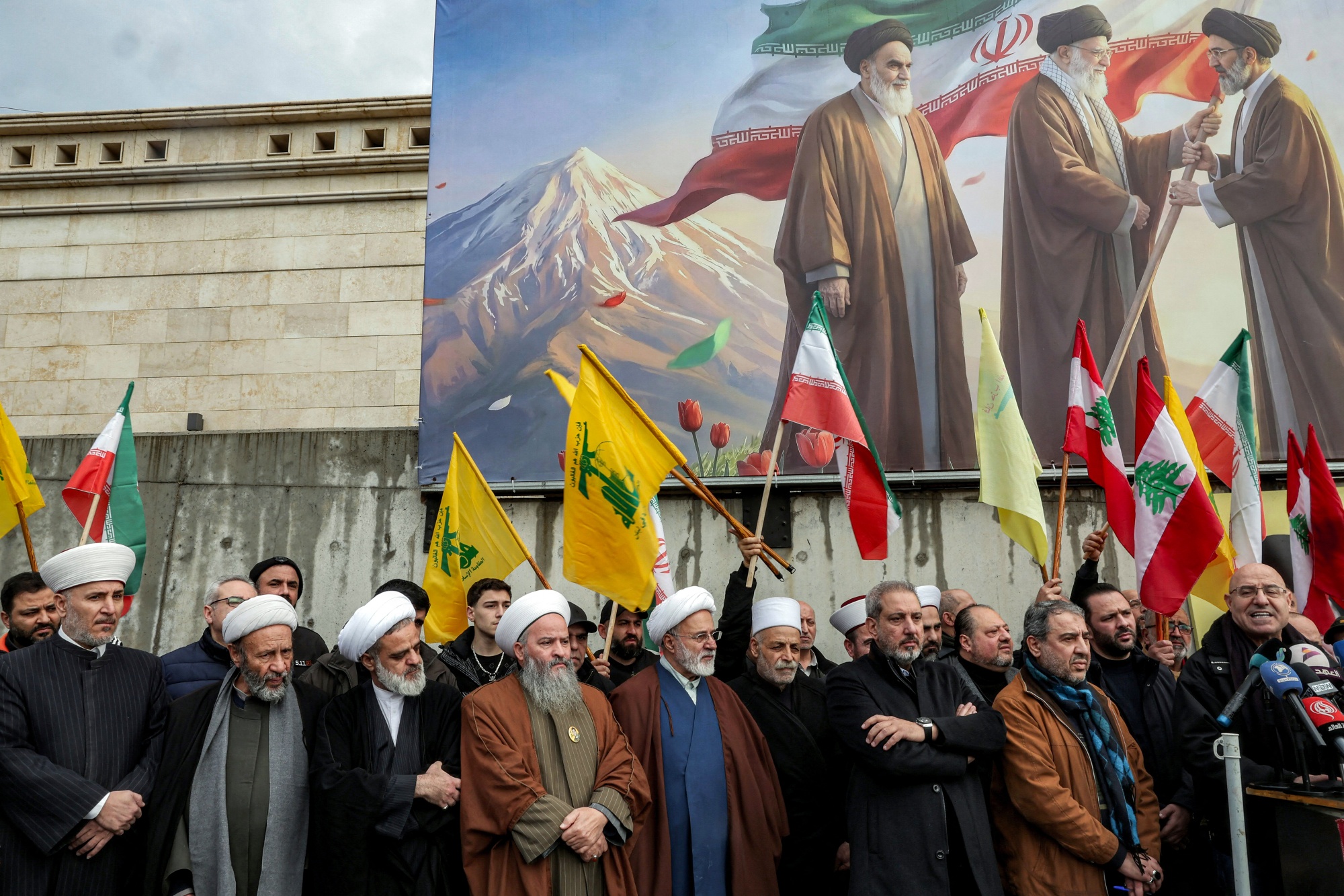 Sunni and Shia Muslim clerics at a rally organised by Lebanese political parties supporting the Hezbollah movement outside the Iranian embassy in Beirut on March 26.