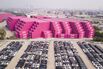 Vehicles at a Shipping Depot as China Says It Won't Submit to U.S. 'Threats' as Trade Talks Near