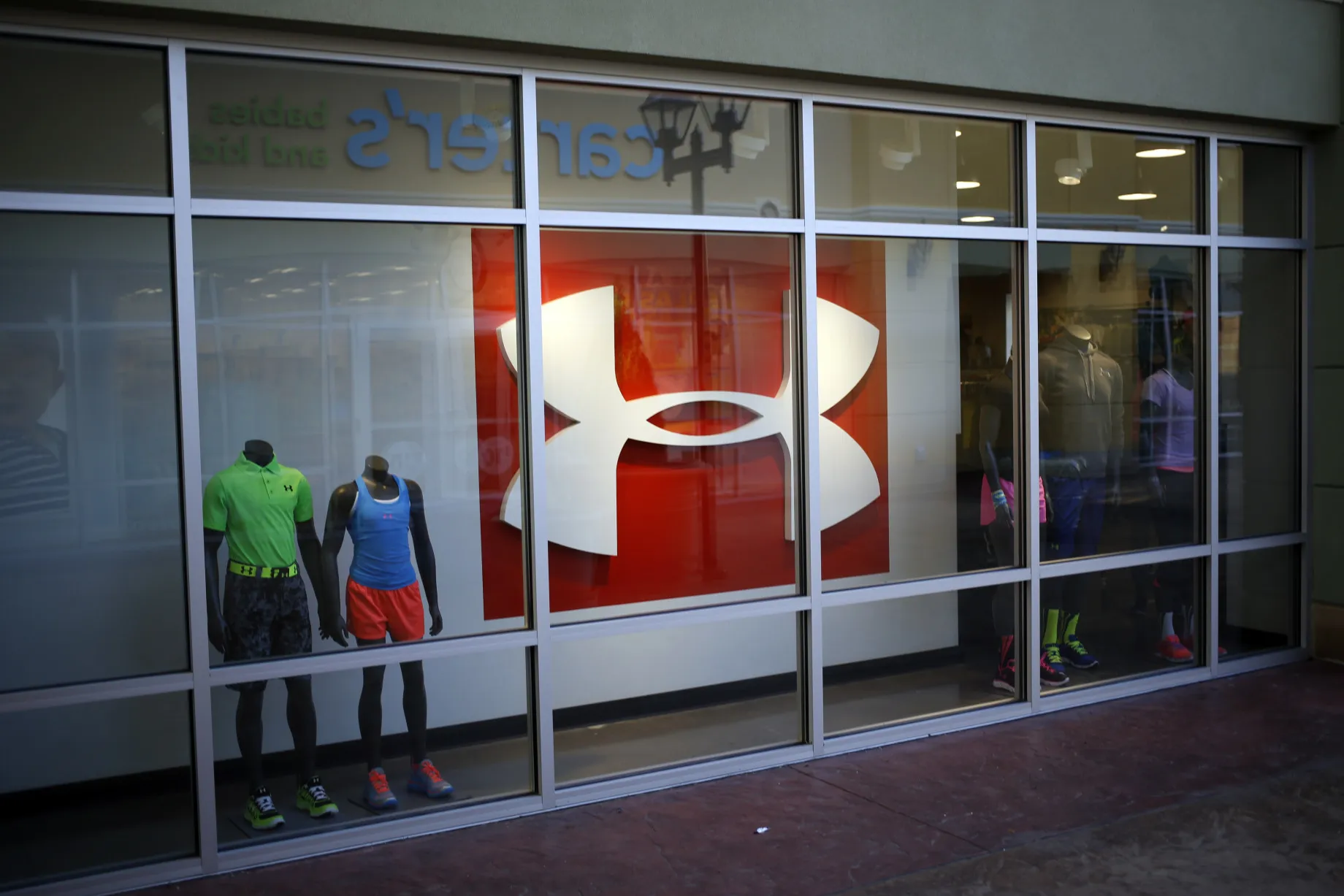 Under Armour Slides After Sales Forecast Trails Estimates