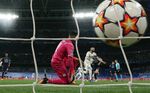 Karim Benzema of Real Madrid scores their side's third goal from the penalty spot during the UEFA Champions League Semi Final Leg Two match between Real Madrid and Manchester City in Madrid on May 4.