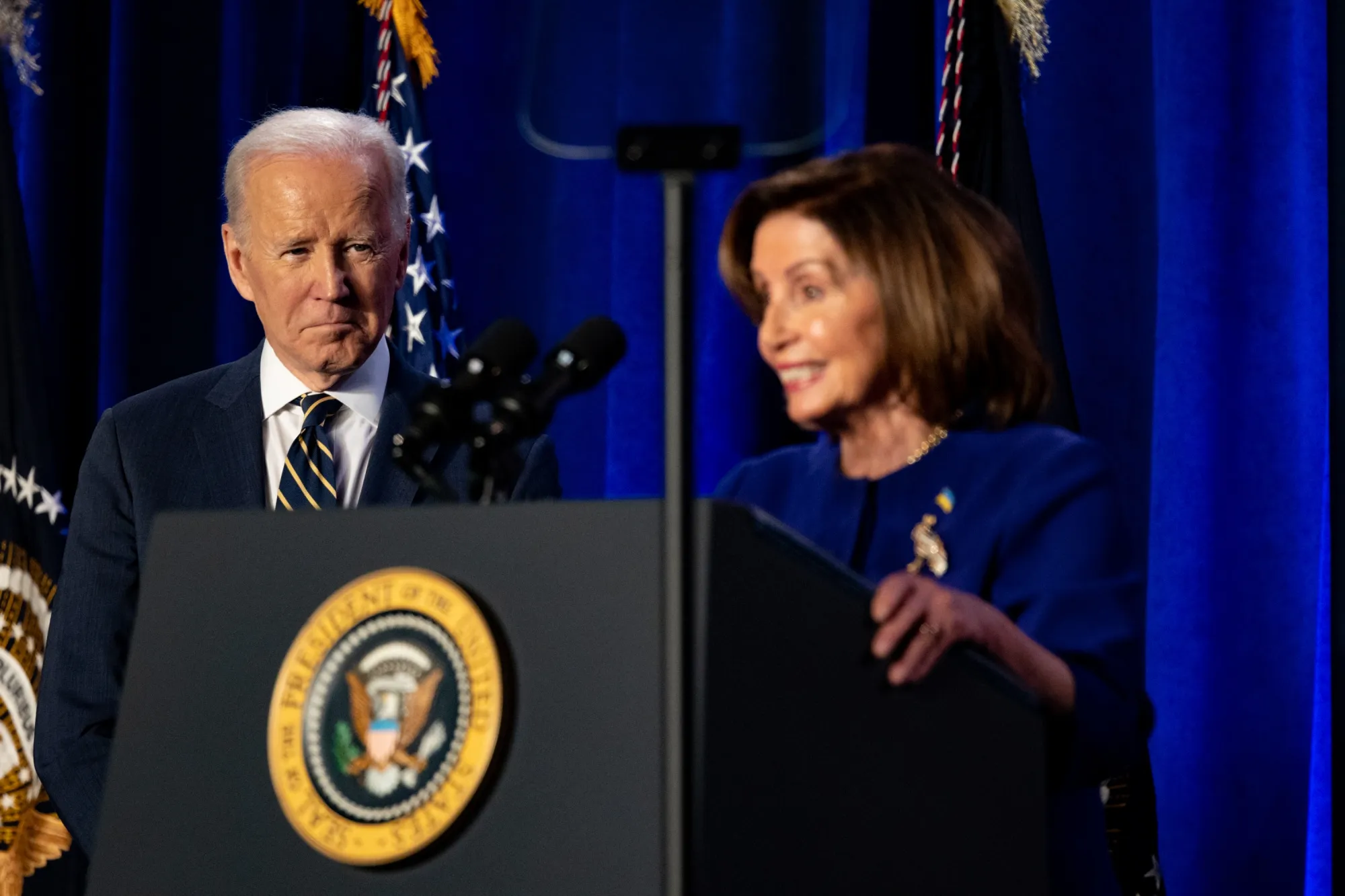 US&nbsp;President Joe Biden listens as US&nbsp;House Speaker Nancy Pelosi speaks during the House Democratic Caucus Issues Conference meeting in Philadelphia, Pennsylvania on March 11.