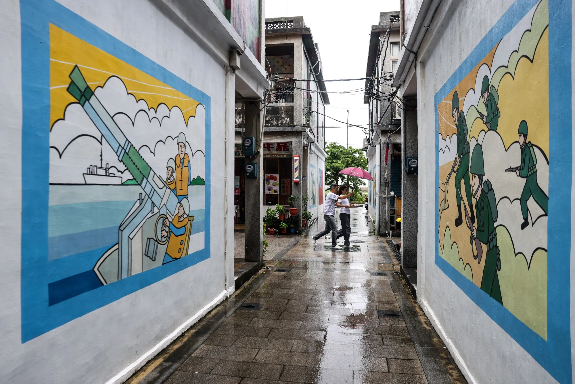 Murals of Taiwanese soldiers on walls in Kinmen, Taiwan.