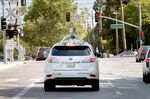 A Google driverless car navigating along a street in Mountain View, California on April 22.  Photographer: Google via AP Photo