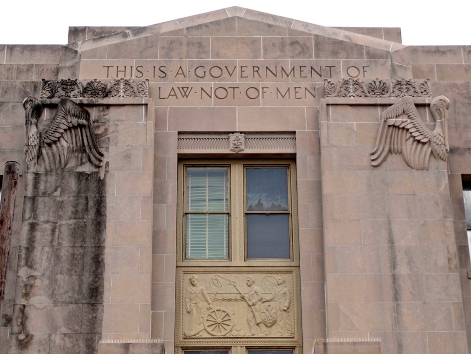 An inscription over the entrance to the Orleans Parish Criminal District Court. 