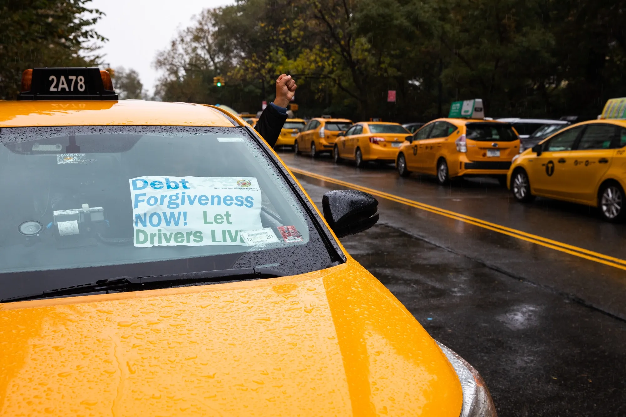 Drivers park their taxis outside Gracie Mansion&nbsp;demanding debt relief in New York in October 2020.