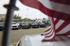 Vehicles are displayed for sale at a General Motors Co. Buick and GMC car dealership.
