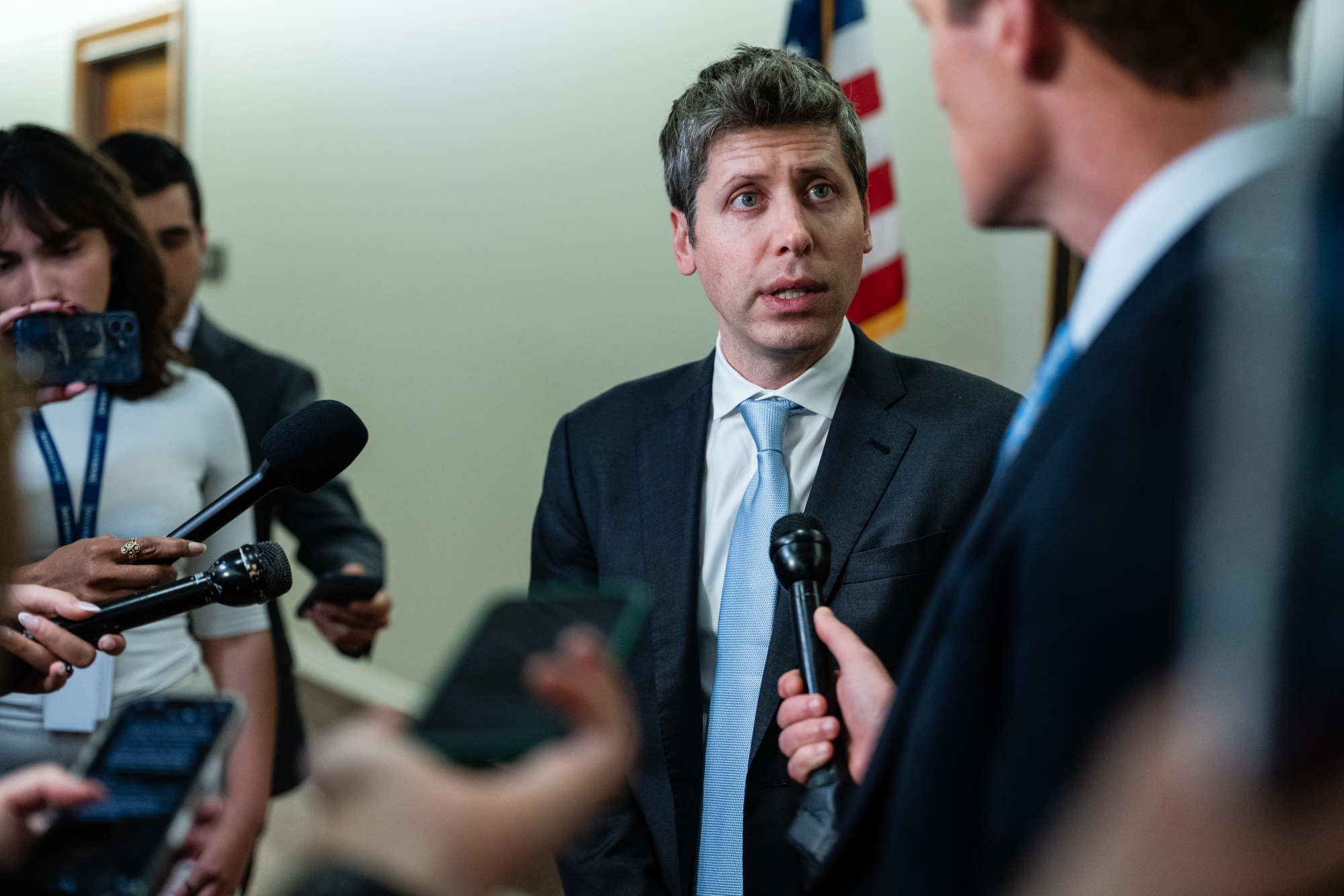 OpenAI CEO Sam Altman speaks with members of the media on Capitol Hill in Washington on June 3.
