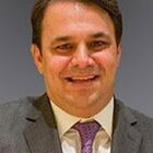 Headshot of Reis L Alfond