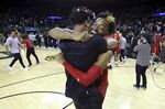 Texas Tech guard Adonis Arms celebrates with a teammate after they defeated No. 1 Baylor in an NCAA college basketball game Tuesday, Jan. 11, 2022, in Waco, Texas. (AP Photo/Jerry Larson)