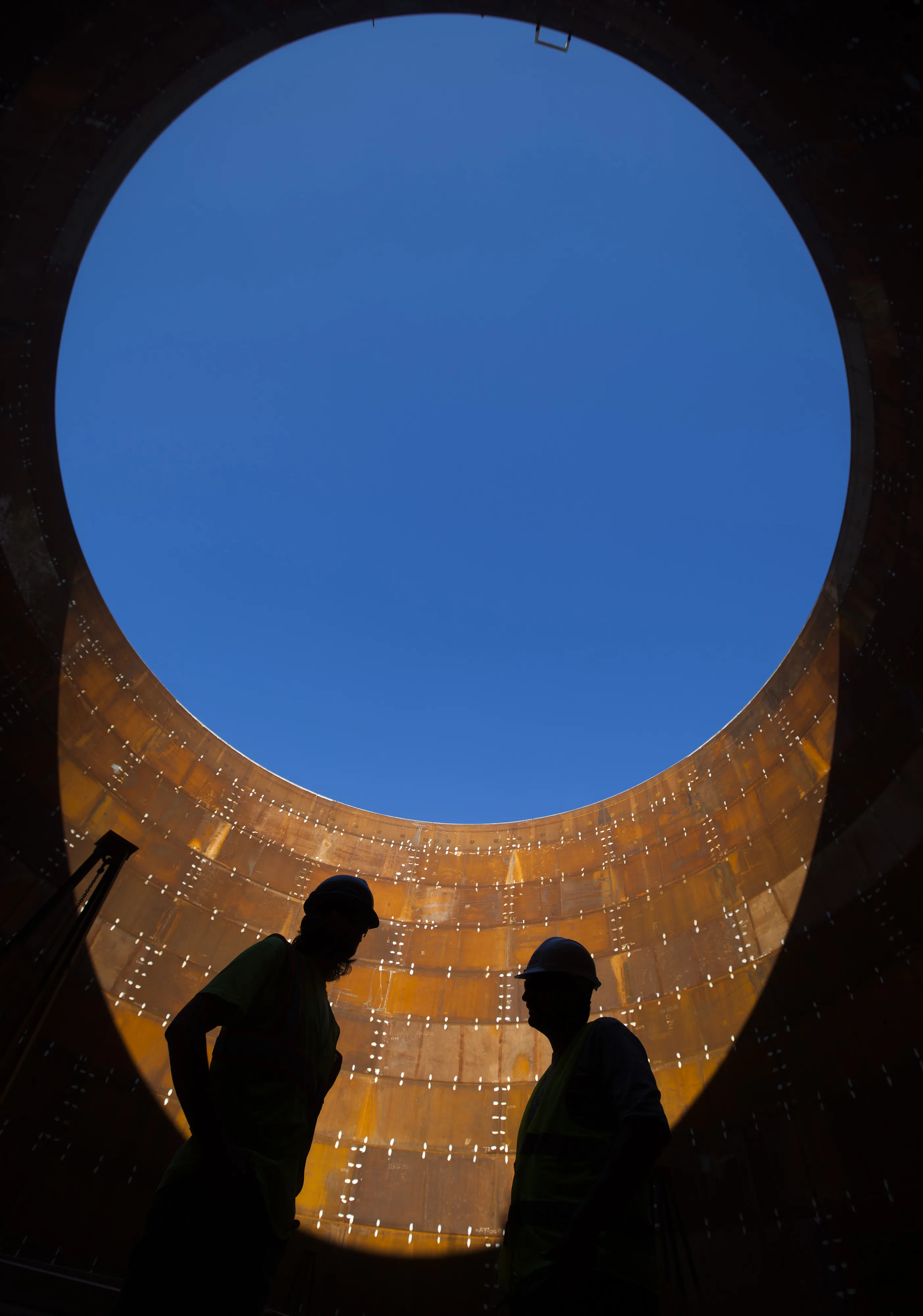 A storage tank under construction.
