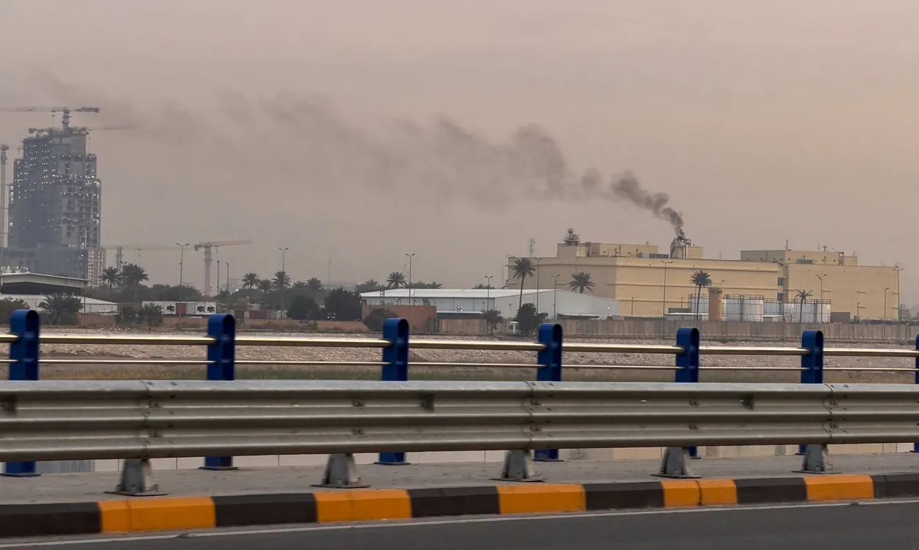 Smoke rises from the US Embassy building in Baghdad on March 14.