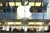 Customers are seen inside an Apple Inc. store in Sydney, Australia, on Thursday, April 13, 2017. The Australian economy will expand 2.5 percent in 2017, 2.8 percent in 2018 and 2.6 percent in 2019, according to a survey conducted by Bloomberg News.