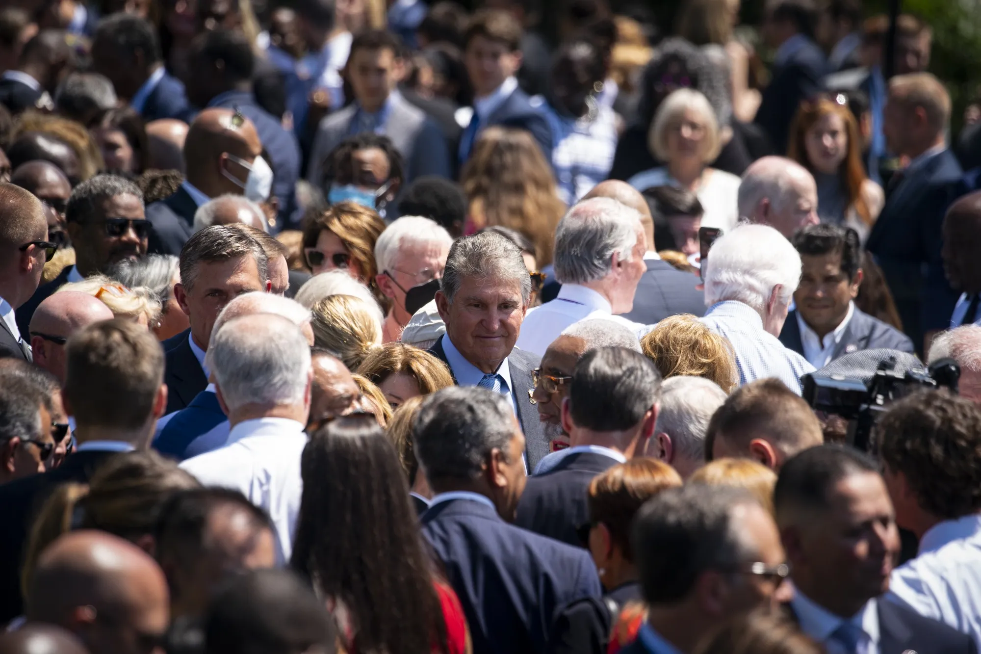 Senator Joe Manchin, center, at an event&nbsp;on the South Lawn of the White House on&nbsp;July 11.&nbsp;