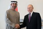 Vladimir Putin, right, and Sheikh Mohammed Bin Zayed Al Nahyan in St. Petersburg on Oct. 11.