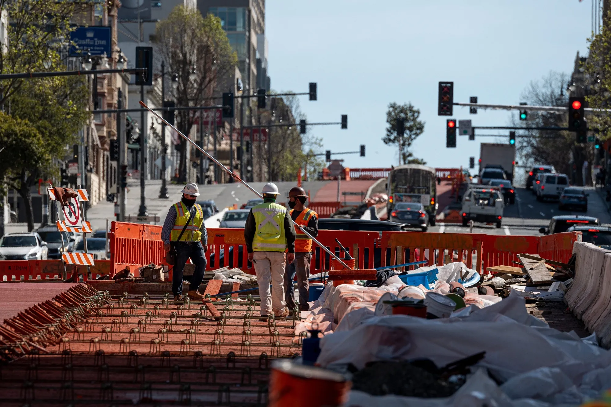 Contractors work on a portion of Van Ness Boulevard under construction in San Francisco.