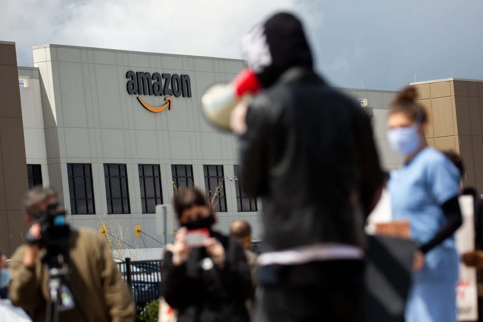 A demoonstrator speaks during a protest outside an Amazon facility in Staten Island, New York on May 1.